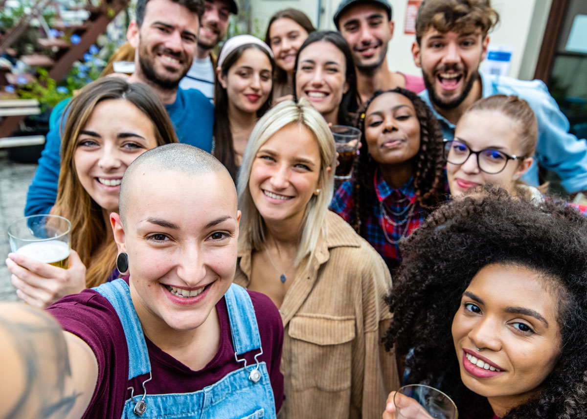 A multicultural group of young adults shows taking a selfie us what the United States does ... and should ... look like.